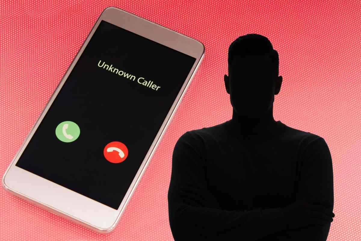 Uomo oscurato e cellulare